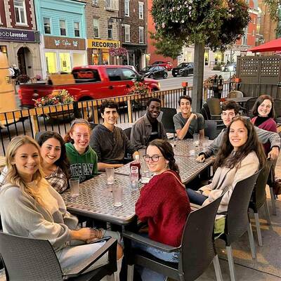 Glynn students sitting together for a meal during the Stratford Festival