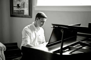 Noah Bongiovanni playing the piano